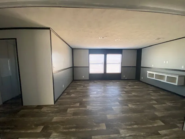 a view of empty room with a window