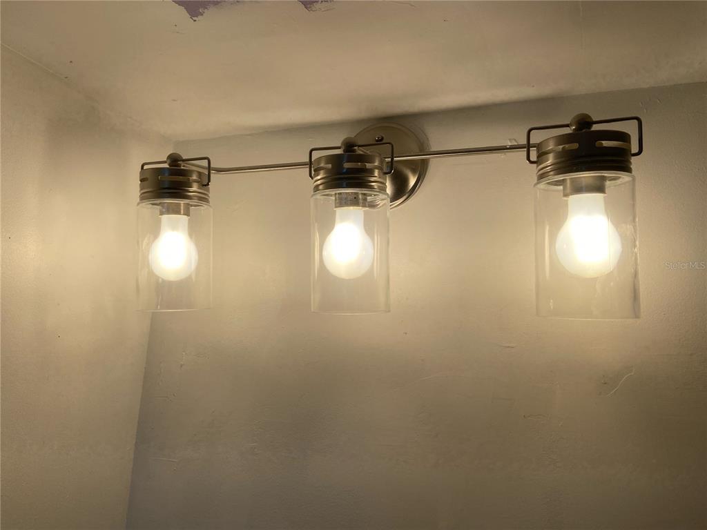 255 Dolphin Point, Unit 809 Clearwater, FL 33767 - Photo 12 of 42 a bathroom with a sink