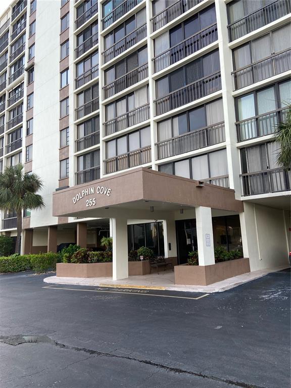 255 Dolphin Point, Unit 809 Clearwater, FL 33767 - Photo 28 of 42 a view of building with a street