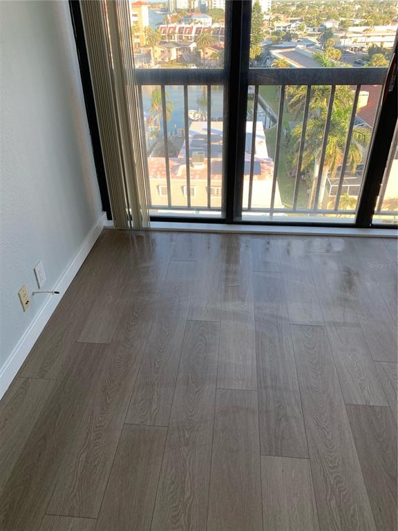 255 Dolphin Point, Unit 809 Clearwater, FL 33767 - Photo 9 of 42 a view of an empty room with a window