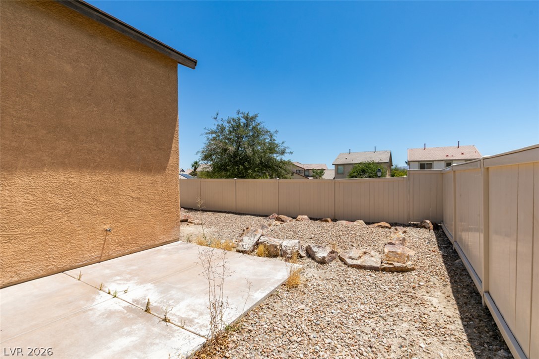 5150 Riverside Run Court North Las Vegas, NV 89081 - Photo 44 of 50 A spacious private yard offers a blank canvas for desert landscaping visions.