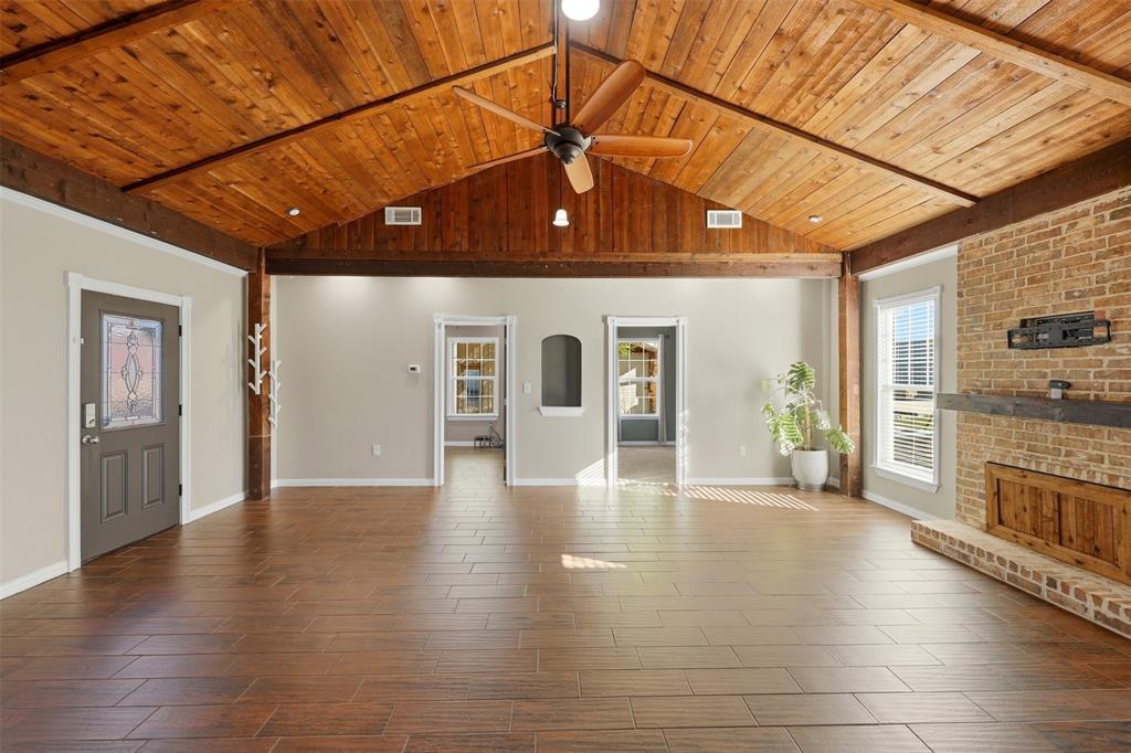 113 Mulkey Road Waxahachie, TX 75167 - Photo 11 of 39 a view of a hall with wooden floor