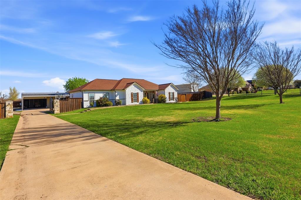 113 Mulkey Road Waxahachie, TX 75167 - Photo 2 of 39 a front view of house with yard