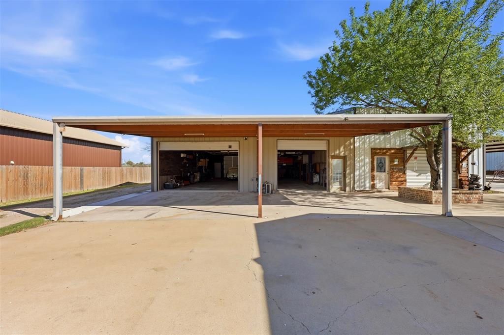 113 Mulkey Road Waxahachie, TX 75167 - Photo 23 of 39 front view of a building with a street