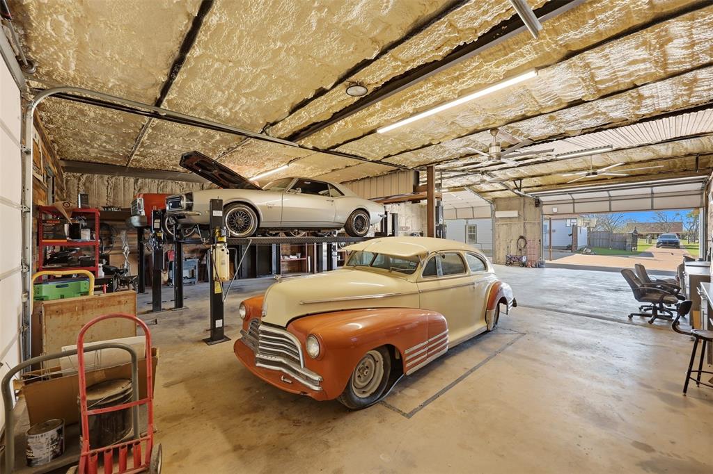 113 Mulkey Road Waxahachie, TX 75167 - Photo 25 of 39 a car parked in a parking garage