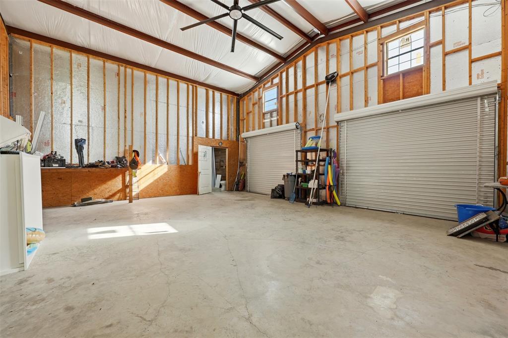113 Mulkey Road Waxahachie, TX 75167 - Photo 28 of 39 a view of a room with gym equipment and a large window