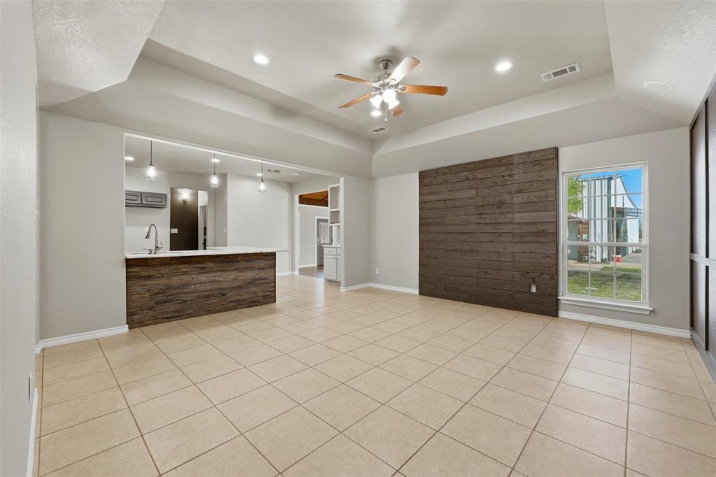 113 Mulkey Road Waxahachie, TX 75167 - Photo 4 of 39 a view of an empty room and window