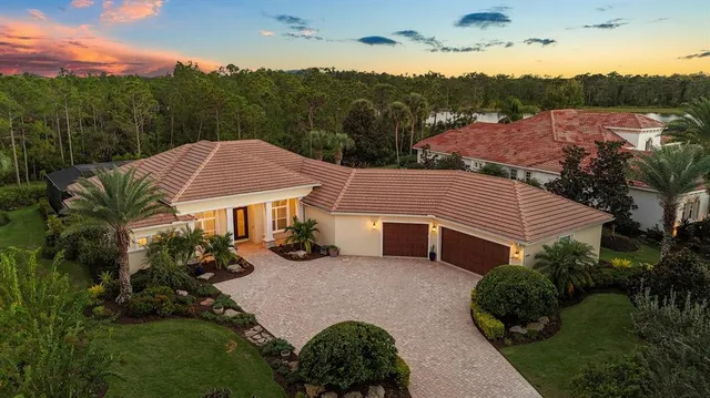 a view of a house with a garden