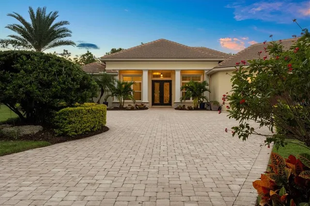 a view of a house with a garden