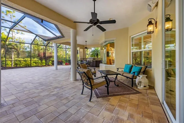 a dining room with furniture and windows