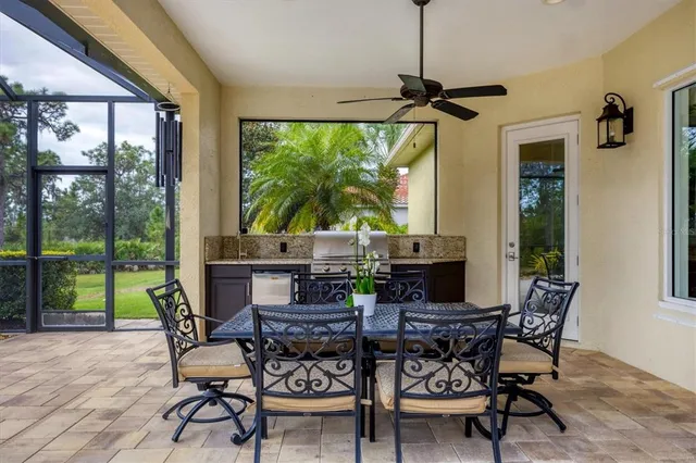 a kitchen with a stove and cabinets
