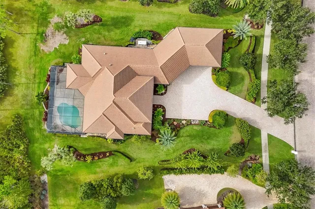 a view of a swimming pool with a patio