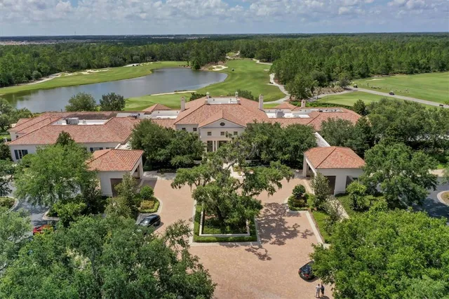 a view of a lake with a building in the background