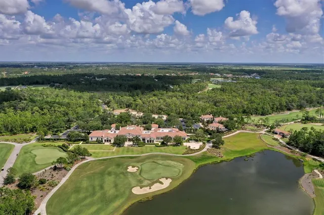 a view of a golf course with a lake