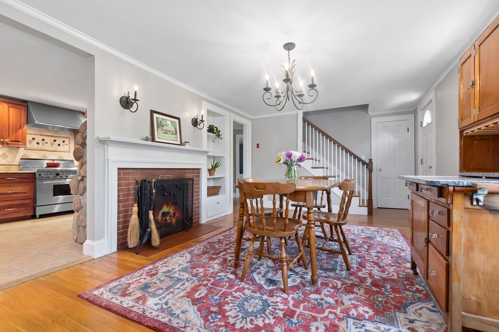 94 Conant Street Danvers, MA 01923 - Photo 15 of 36 a view of a livingroom with furniture and a fireplace