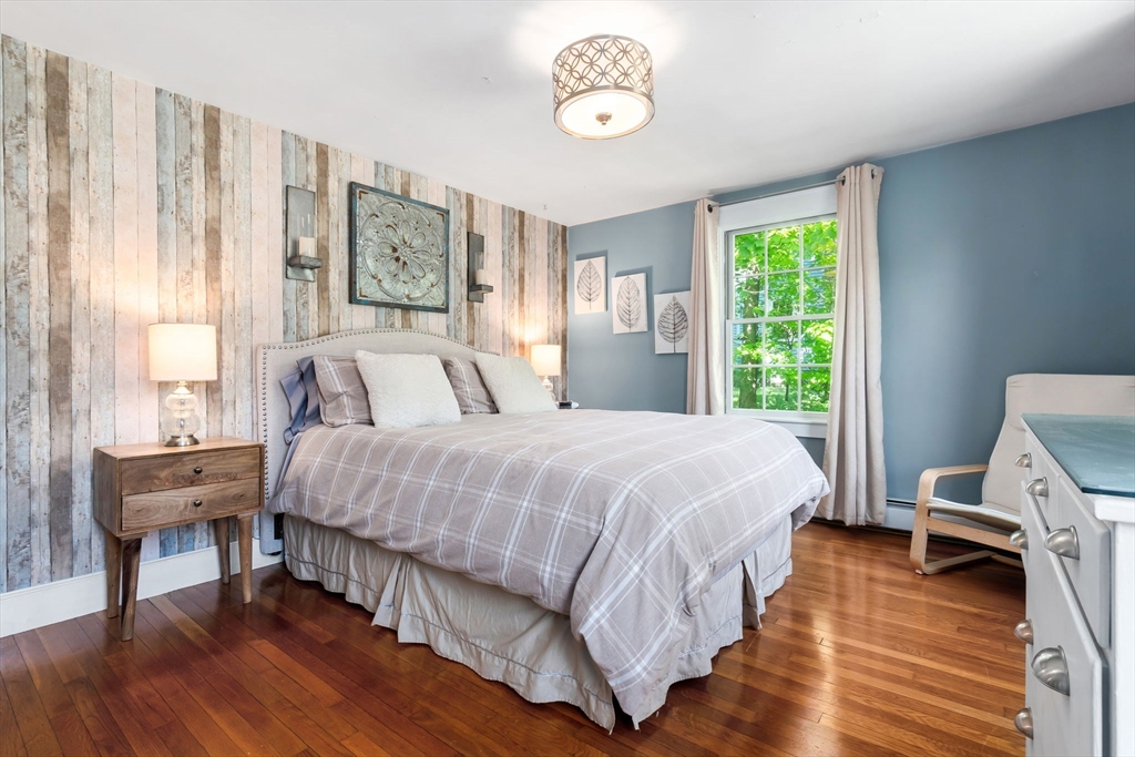 94 Conant Street Danvers, MA 01923 - Photo 19 of 36 a bedroom with a bed and a window