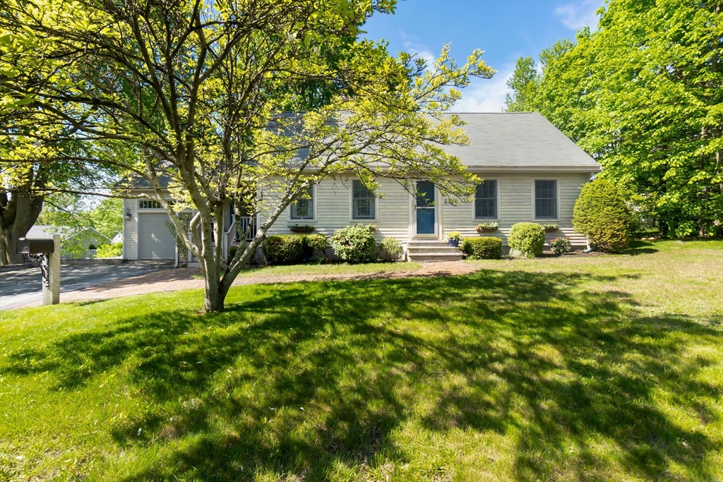 94 Conant Street Danvers, MA 01923 - Photo 2 of 36 a front view of a house with garden