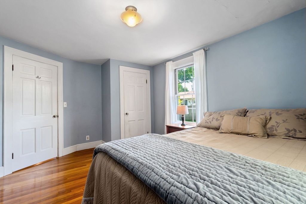 94 Conant Street Danvers, MA 01923 - Photo 21 of 36 a bedroom with a bed and window