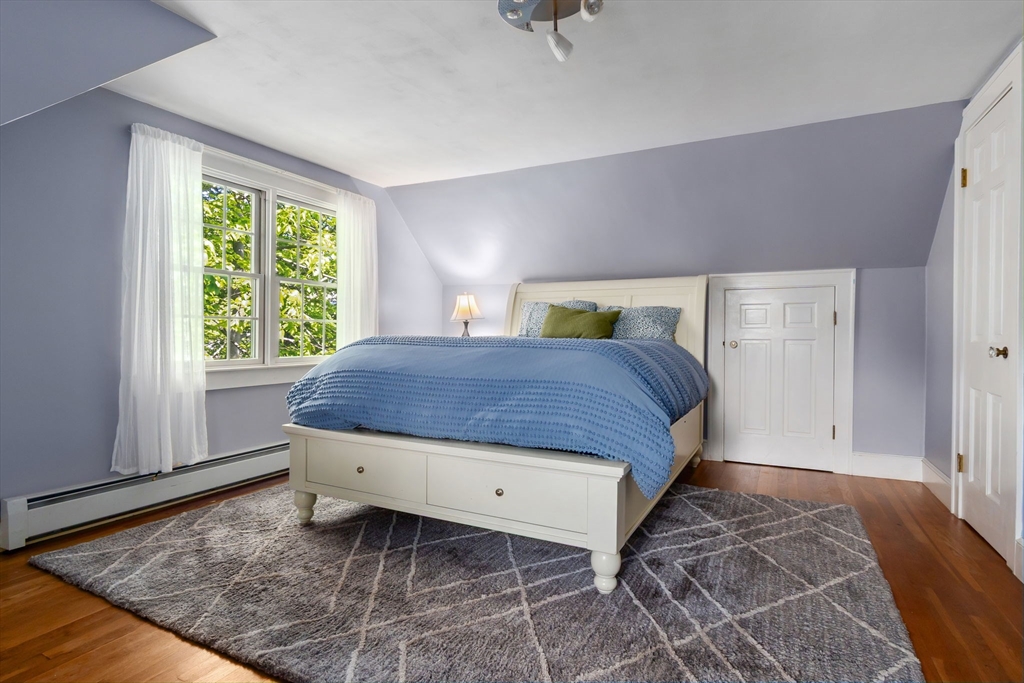 94 Conant Street Danvers, MA 01923 - Photo 24 of 36 a bedroom with a bed and window