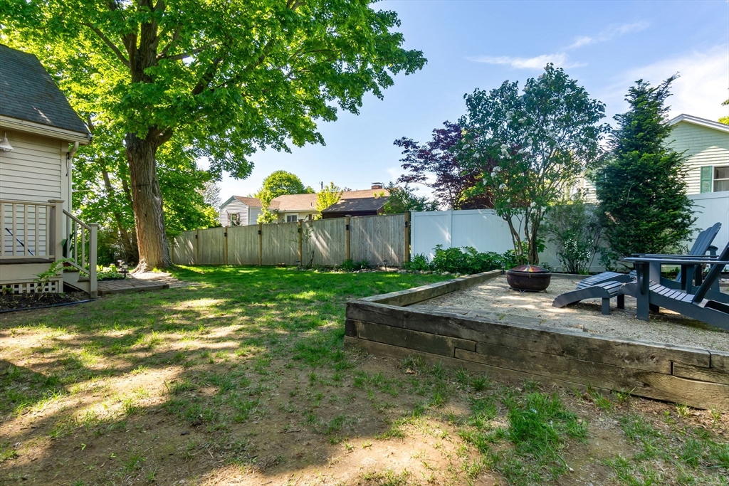 94 Conant Street Danvers, MA 01923 - Photo 33 of 36 a view of a house with backyard and sitting area