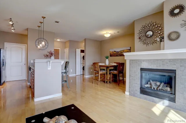 a bedroom with bed and a chandelier