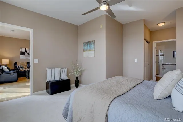 a bathroom with a granite countertop sink a mirror a shower and a bathtub