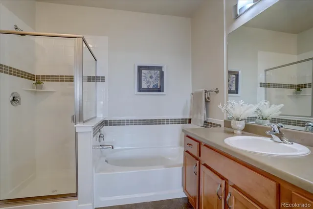 a utility room with sink dryer and washer