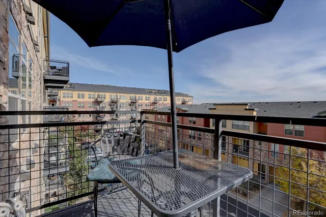 a view of a dining area with furniture window and outside view