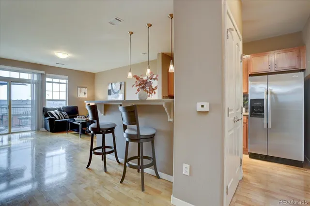 a kitchen with stainless steel appliances granite countertop a stove and a sink