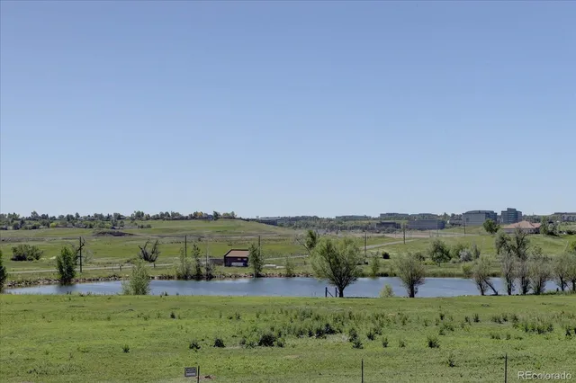 a view of a brick building with many windows