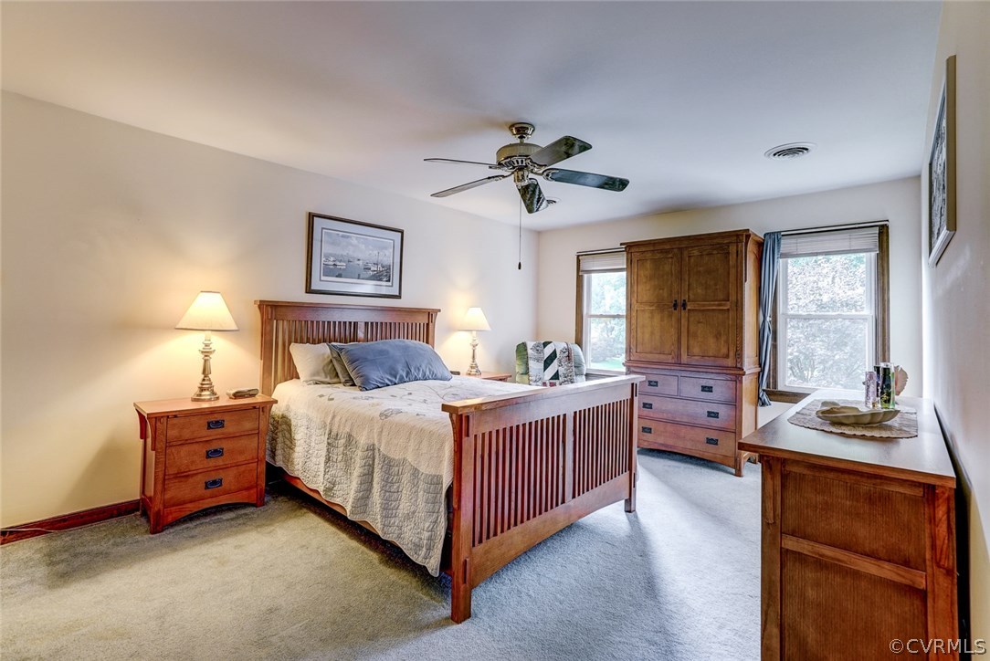 6100 Springwood Road Chester, VA 23831 - Photo 12 of 25 a bed room with a bed and a window