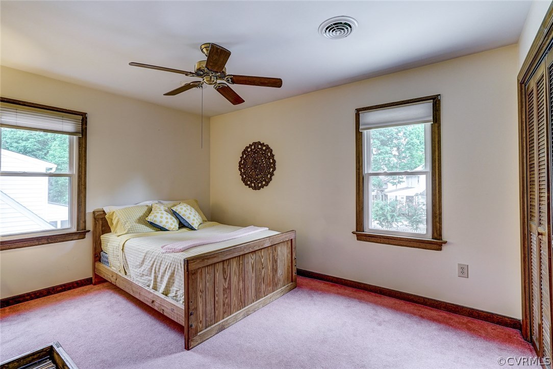 6100 Springwood Road Chester, VA 23831 - Photo 16 of 25 a bedroom with a bed and window