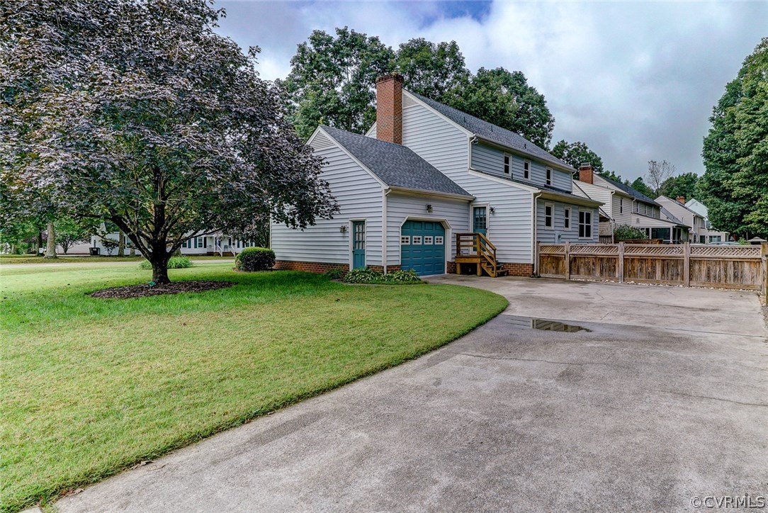 6100 Springwood Road Chester, VA 23831 - Photo 24 of 25 a view of house with a yard