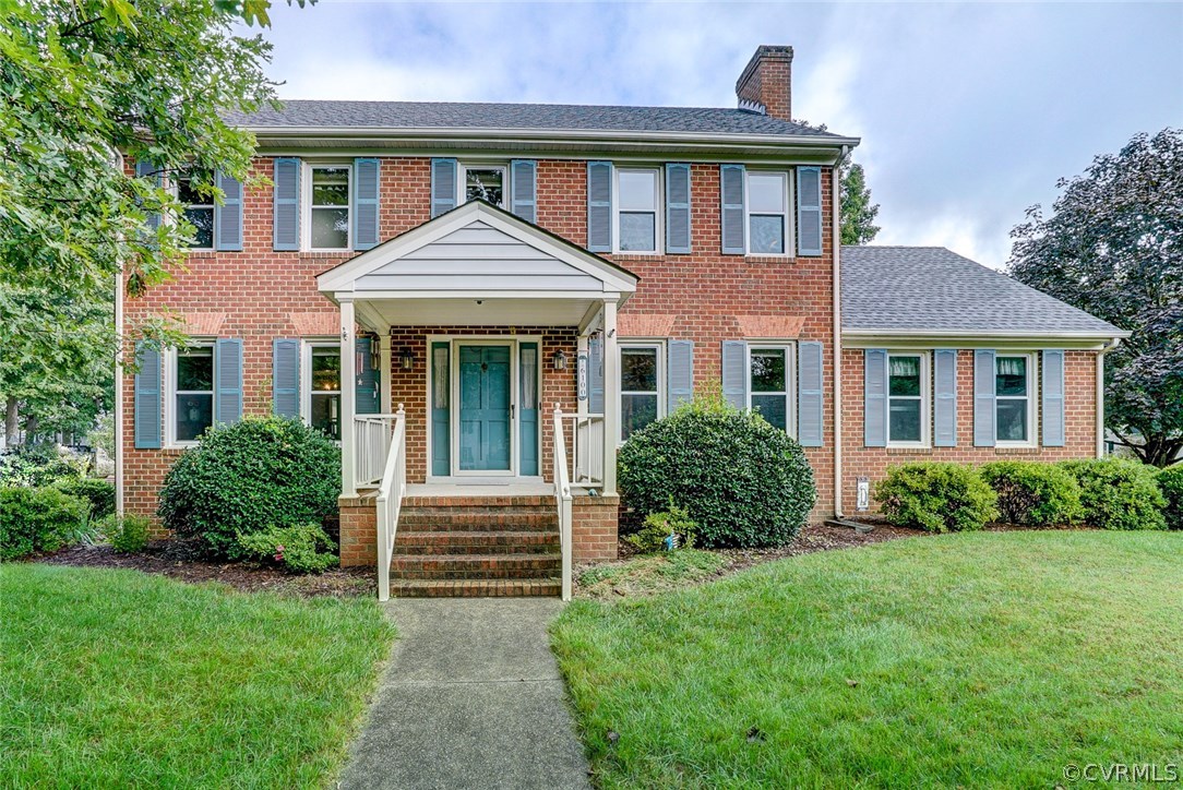 6100 Springwood Road Chester, VA 23831 - Photo 25 of 25 a front view of a house with a yard