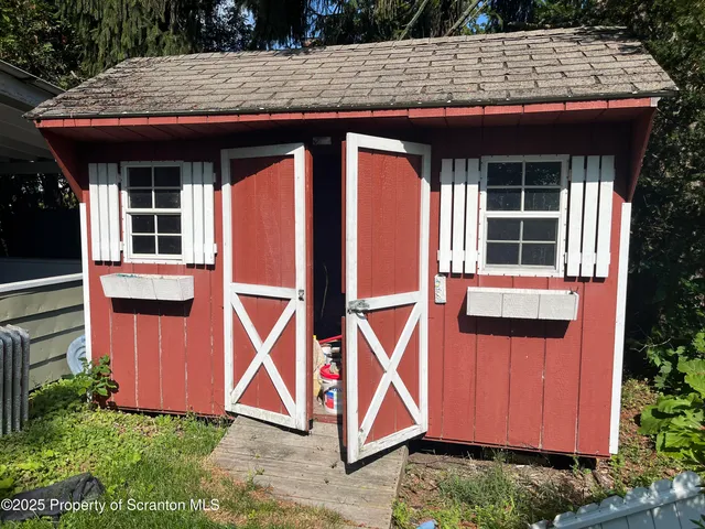 a kitchen with stainless steel appliances granite countertop a stove a refrigerator and a sink