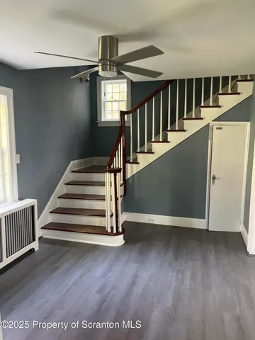 a bathroom with a sink and vanity