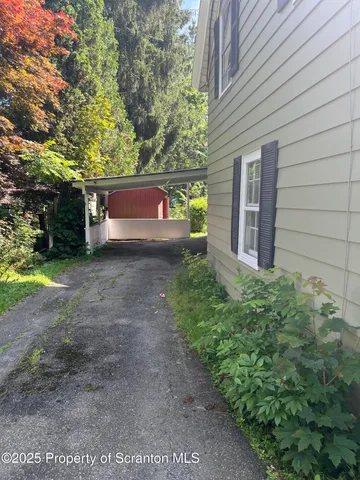 a view of backyard of house