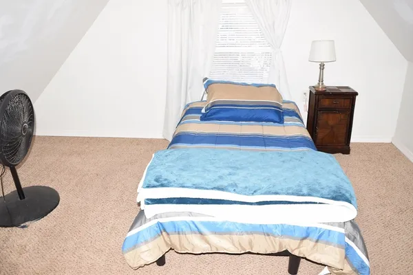 a living room with a rug