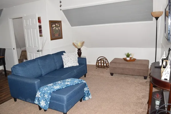 a living room with furniture and a couch