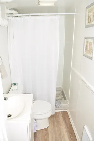 a bedroom with a bed and cabinets