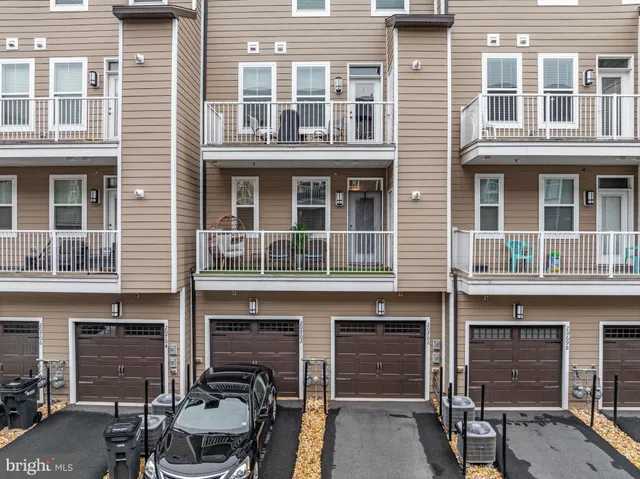 a front view of a building with balcony
