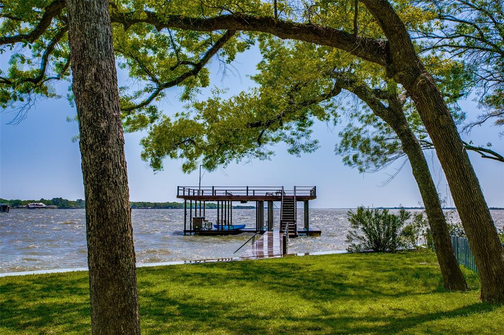 186 Enchanted Drive Enchanted Oaks, TX 75156 - Photo 1 of 1 a view of a yard with a tree