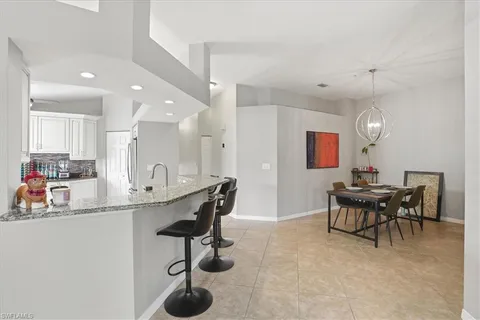 $435,000 | 6829 Satinleaf Road South, Unit 204, Naples, FL 34109