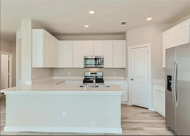 view of a wall with a large mirror on a wall