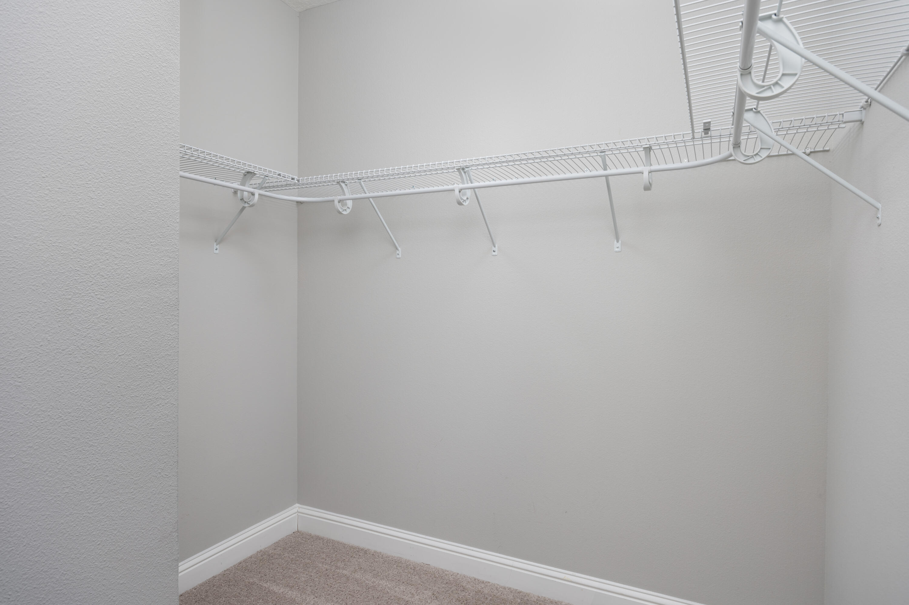 134 Laurel Oaks Drive Freeport, FL 32439 - Photo 21 of 30 a view of a room with racks on the wall