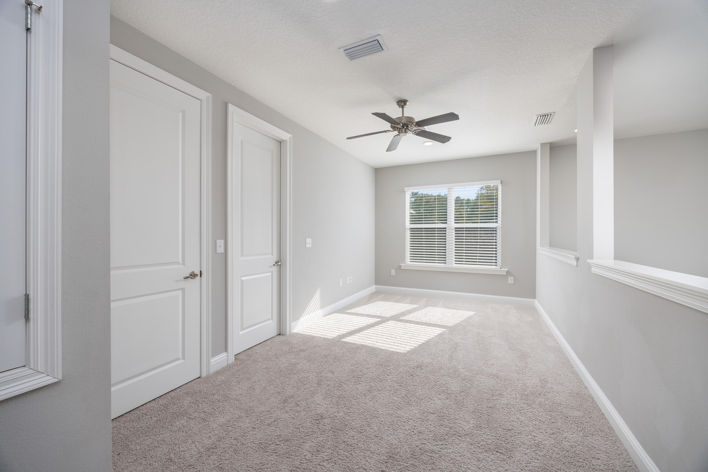 134 Laurel Oaks Drive Freeport, FL 32439 - Photo 22 of 30 a view of an empty room with a window