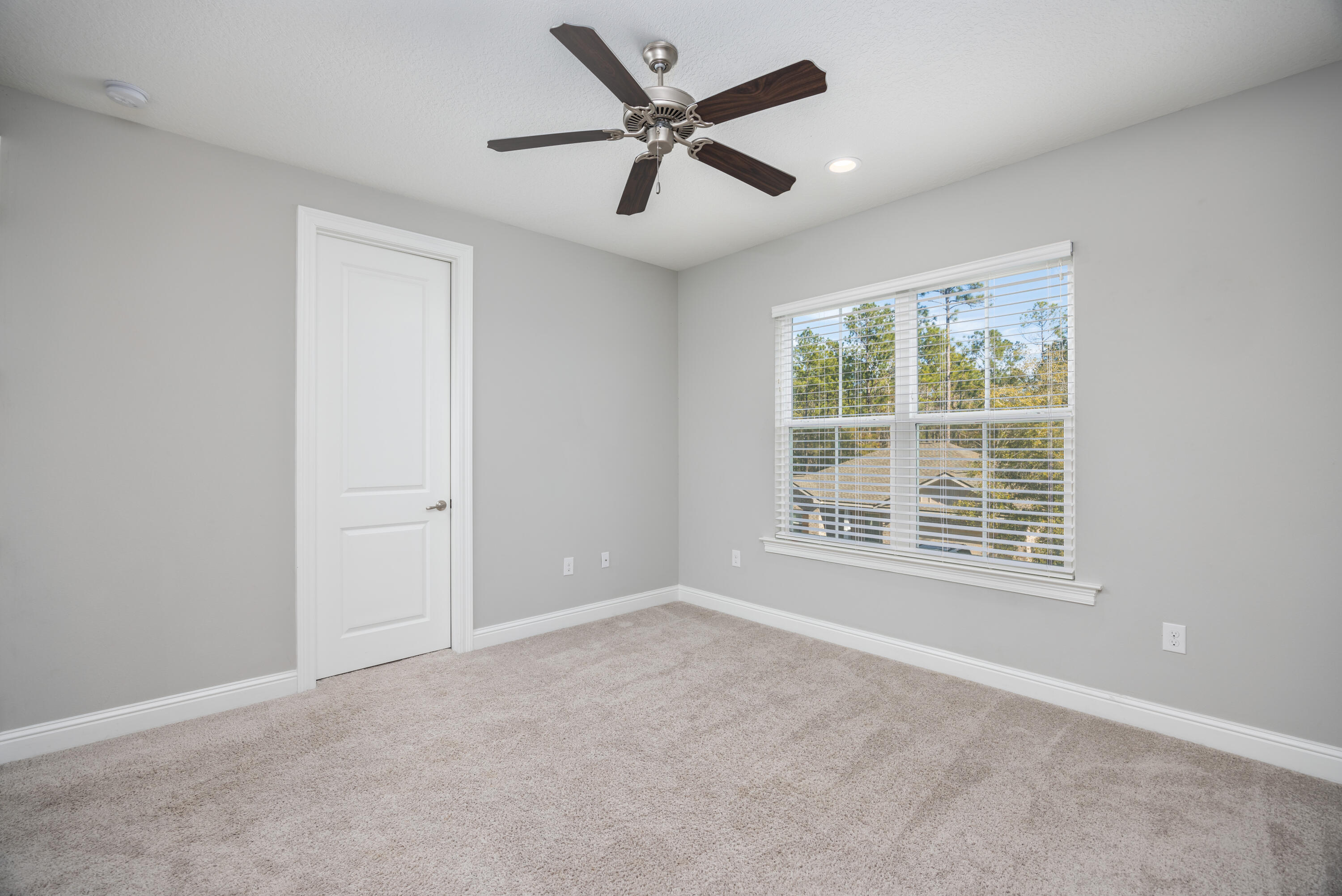 134 Laurel Oaks Drive Freeport, FL 32439 - Photo 23 of 30 a view of an empty room with a window