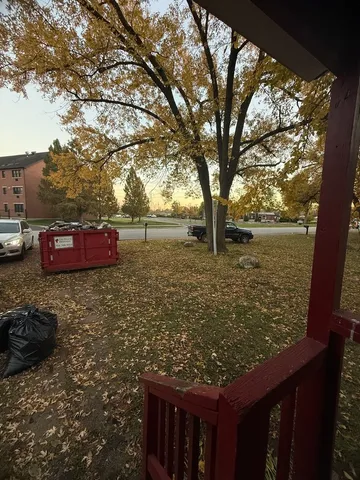 a view of a yard with an outdoor space