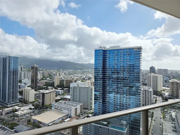 a view of a balcony with city view