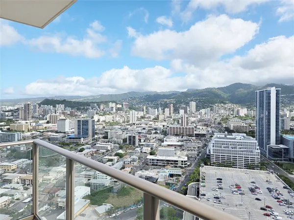 a view of a city skyline from a balcony